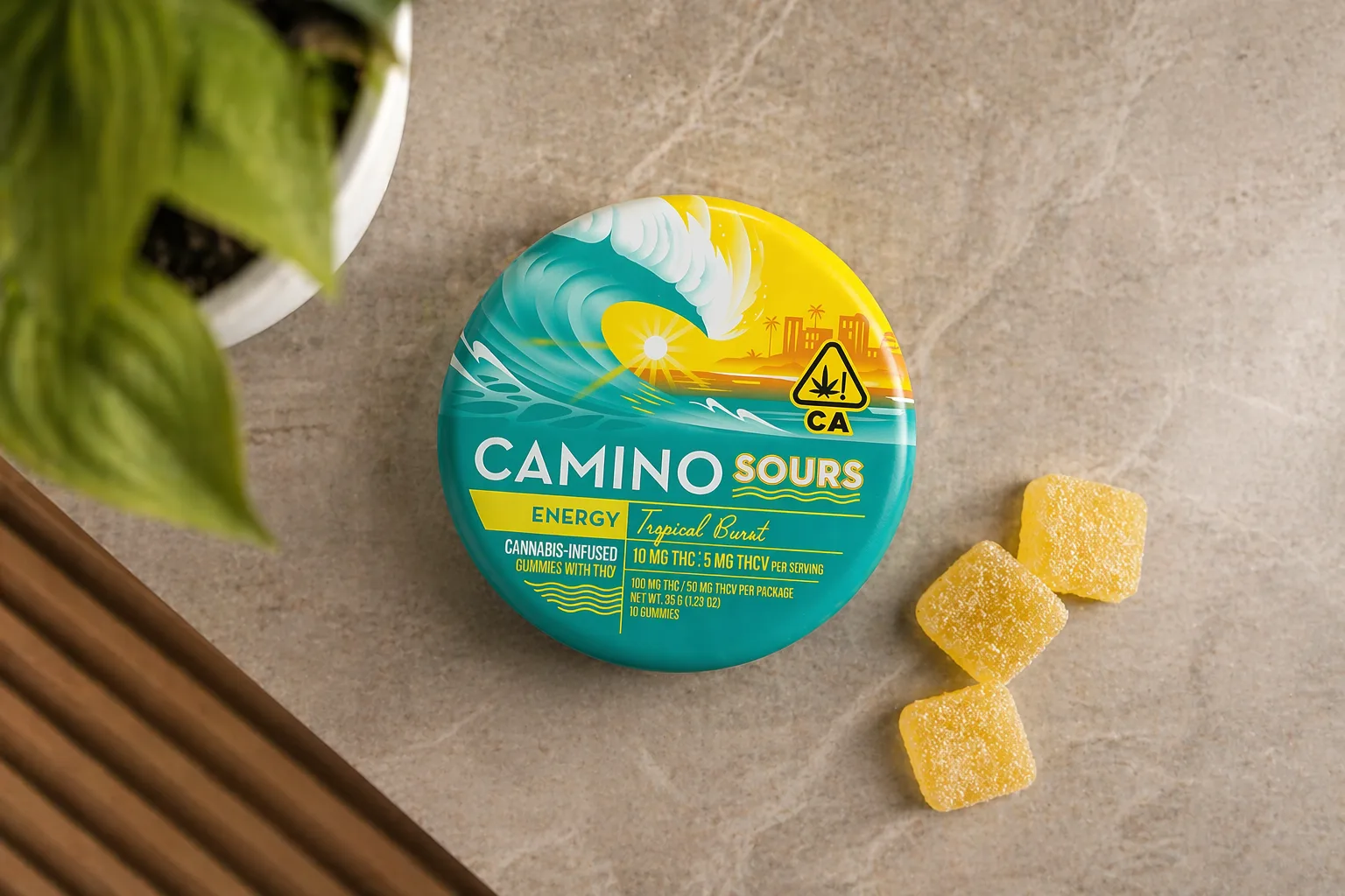 Top view of Camino Sours tropical burst cannabis infused gummies container and pieces