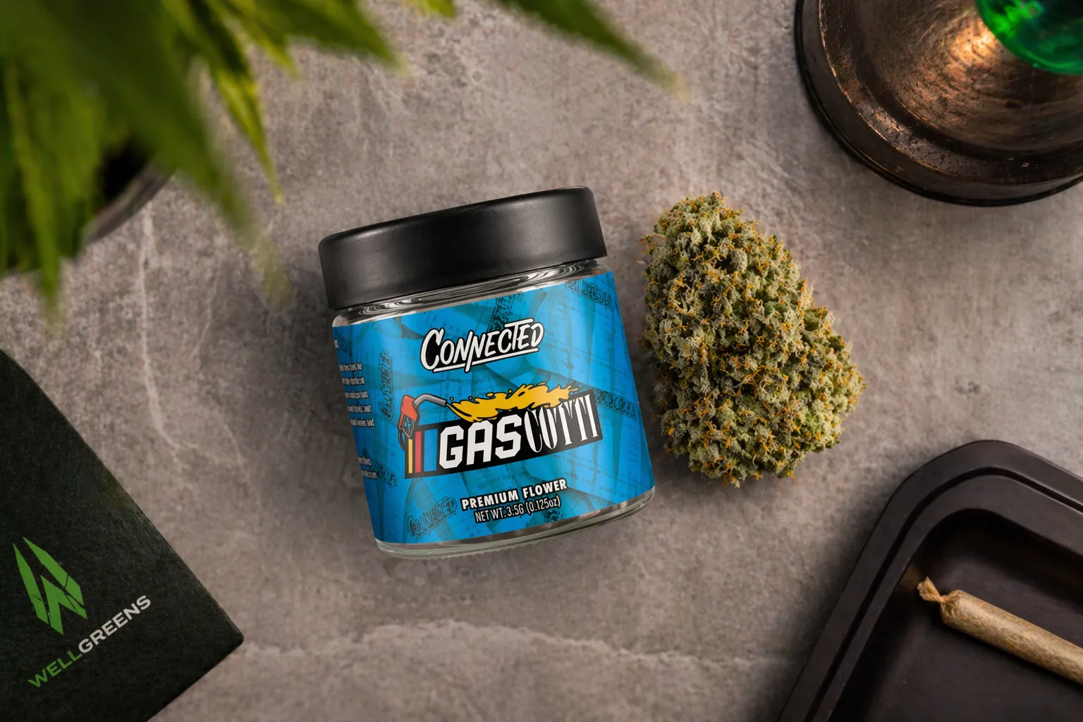 Top view of cannabis flower jar and bud