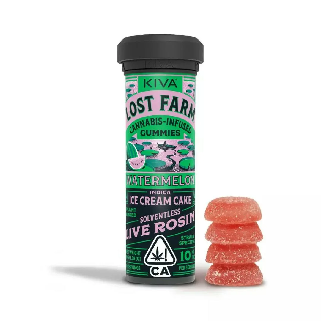 Kiva Lost Farm black tube of Watermelon Ice Cream Cake indica solventless live rosin gummies beside four pink sugar-dusted dome gummies.